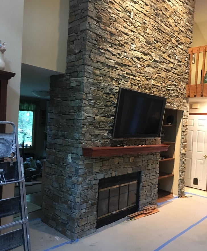 Custom stone tile fireplace design Custom stone tile fireplace design